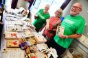 Annie Roden, Maggie Stace, and Neil Roden sell items to raise money for Macmillan Cancer Support. Picture: Steve Richardson