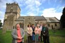 Rev Doris Goddard with church goers, hoping to raise the funds to save their church tower