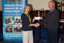 John Nicholls presenting cheque to Debbie Birtwistle from Dorset & Somerset Air Ambulance. Credit: Alan Gitsham