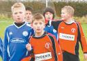 Avishayes Combe Raiders U-11s (red shirts) are pictured in action against Parcroft at the weekend.