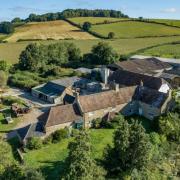 A Grade II listed farmhouse and adjoining cottage is up for sale. Picture: Carter Jonas