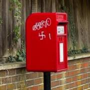 The offensive graffiti was sprayed on a post box in Tatworth