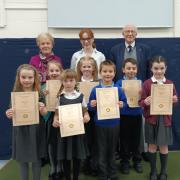 A group of pupils with their certificates at Herne View Primary in Ilminster
