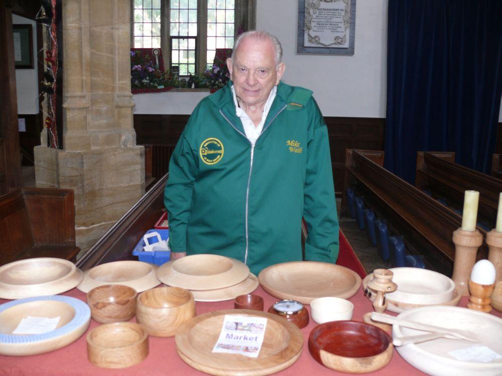 Mike Webb of Ilminster with wooden items he made to raise funds for Children's Hospice South West at the Church Fete in the Minster.