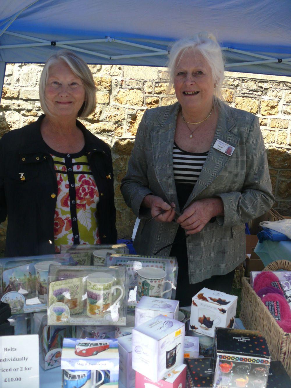 Julia Woodwards and Gina Clark on a fundraising stall for St Margaret's Somerset Hospice at charity drive on the path into Greenfylde First School.