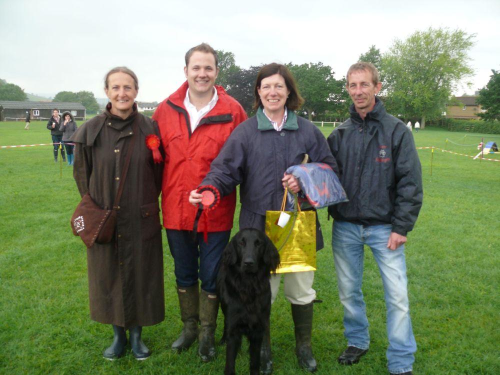 SHEILA Taylor, judge of Sheila’s Ark, Robert Schuler of Barking Mad, Margaret Hallam from Buckland St Mary with Purdey, winner of Best in Show at the Family Dog Show and John Tierney of Glamour Pets.