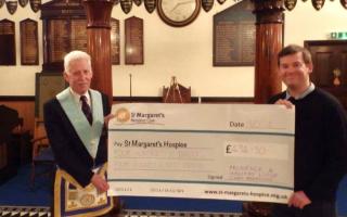 Chard Freemasons presented cheques worth nearly £1,000 to the MS Society and St Margaret’s Hospice