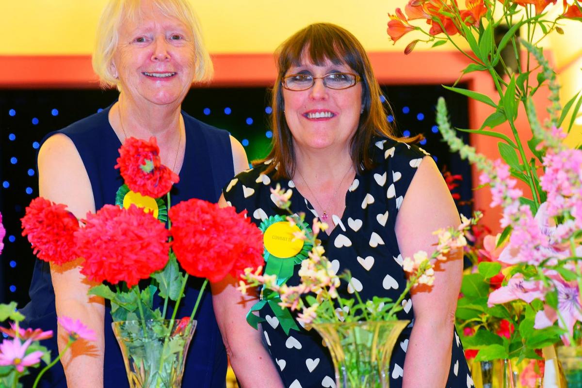 IN BLOOM: Committee president Doreen Toms and committee member Angie Davies