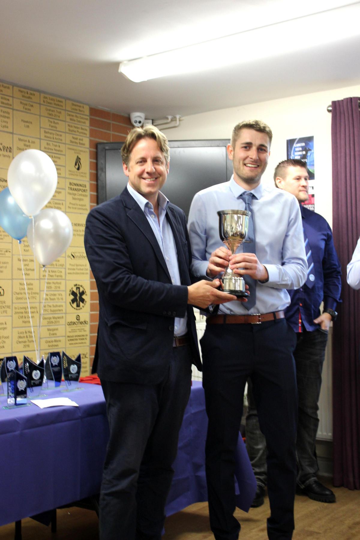 Marcus Fysh presenting captain Jonny May with the Somerset County Division 1 Champions Trophy won by the Men's 1st XI