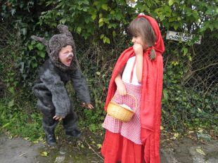 Big Bad Wolf George Crowter, 4, pounces on friend Zuleika Driver, 4, as ‘Little Red Riding Hood’