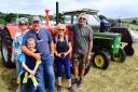 Hayley, Andy, and Oscar Yells with Chris and John Salter at Yesterday's Farming near Ilminster. Picture: Steve Richardson