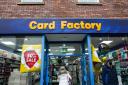 Shoppers enter a Card Factory store in Newcastle-under-Lyme, Staffordshire.