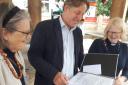 MP Marcus Fysh reading the letters in Ilminster