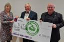 Cheque being presented to Debbie Birthwhistle of DSAA by Stuart Pope & Jim Laughlan.