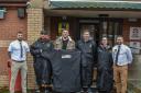 N&G Groundworks representatives present the new sub suits to the club.