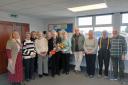 Cath Holloway, from Spark Somerset (first from the left) with Pat Galpin (holding a bouquet) at the meeting