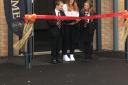 Holyrood Academy students, Hannah, in Year 13, and Mylo and Caitlyn, in Year 7, cut the ribbon at the opening ceremony.