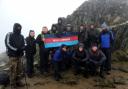 CHARITY CHALLENGE: Leading airman Pete Medhurst (back, middle) at Mount Snowdon with shipmates from HMS Queen Elizabeth