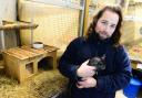 Gabriel Tipney from the animal care team with Dusty the Chinchilla at Ferne Animal Sanctuary.