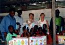 Sandra and Carol are pictured with children reading the News