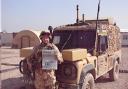 Cpl Jon Stone reads the News in Iraq