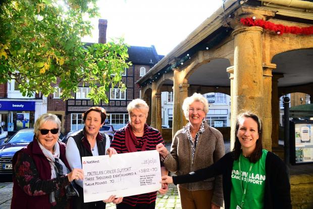 Chard & Ilminster News: Macmillan cheque presentation re the Archie Gooch Pavillion coffee morning in Ilminster. Glenys Whaites, Angie Blackwell, Shirley Farley, Julie Fowler and Genevieve Drinkwater [Regional Fundraising Manager ; Macmillan South West]