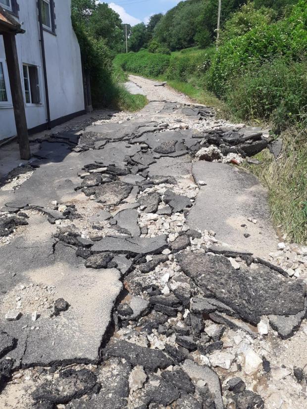 Chard & Ilminster News: Scrapton Lane In Combe St Nicholas Following Damage By Flash Flooding. CREDIT: Somerset County Council. Free to use for all BBC wire partners.