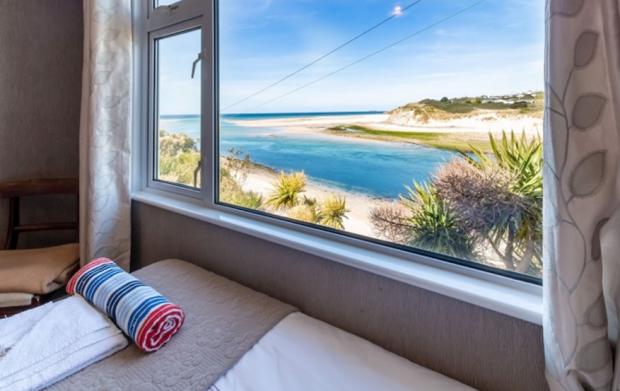 Chard & Ilminster News: Stunning absolute sea beachfront Beach House St Ives Bay. Credit: Vrbo