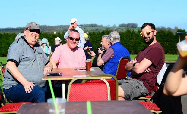 Chard & Ilminster News: Tony Oliver, Martin Goodhew, and Craig Lucas make the most of the sunshine in Tatworth. Picture: Steve Richardson