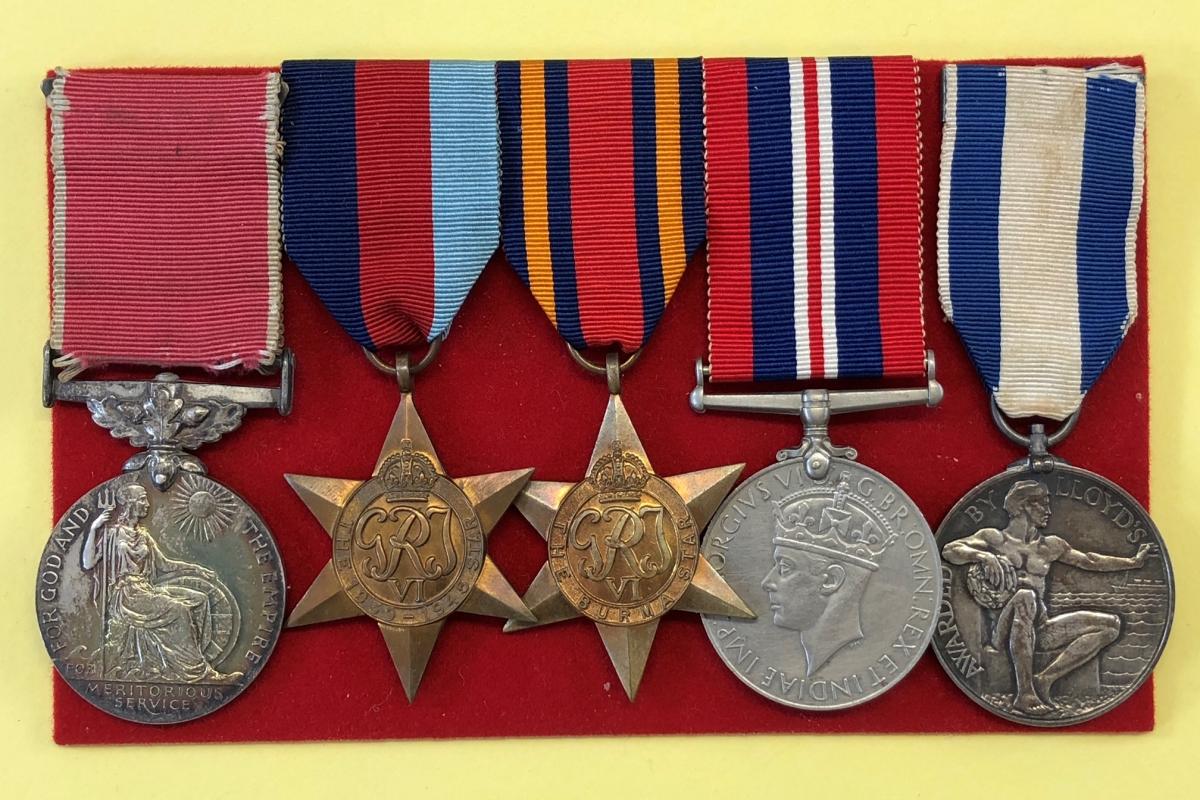 The group of medals awarded to Apprentice Clark being sold by Charterhouse £600-1,000
