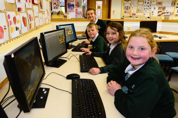 Chard & Ilminster News: Abi, Skye, Ley and Oliver from Hawthorne Class in IT