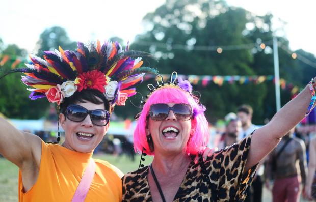 Chard & Ilminster News: Lucy Ferris and Georgie Flawn in their Mardi Gras gear at Shindig Festival. Pictures: Steve Richardson