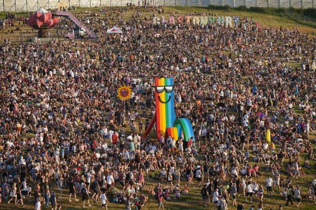 Chard & Ilminster News: Glastonbury attendees enjoyed warm weather on the first day of the event (PA)