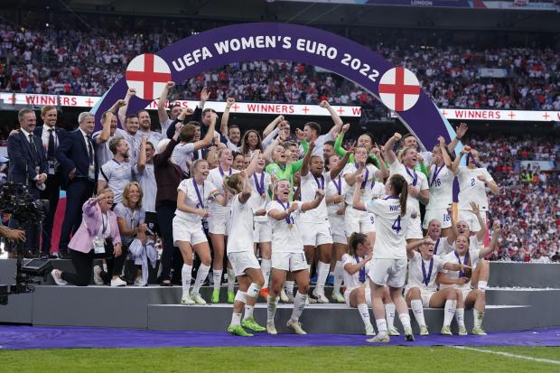 Chard & Ilminster News: England players celebrate with the trophy following victory over Germany in the UEFA Women's Euro 2022 final at Wembley Stadium, London. Picture date: Sunday July 31, 2022.