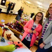 Buckland St Mary flower show at the village hall ; visitors Lucinda and Immy Wood.