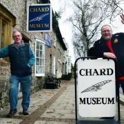 Chard Museum chairman Vince Lean (left) and trustee Howard Bailey (right) celebrating winning last year. Picture: Newsquest