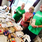 Annie Roden, Maggie Stace, and Neil Roden sell items to raise money for Macmillan Cancer Support. Picture: Steve Richardson