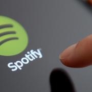 Spotify's Playlist in a Bottle feature allows you to create a playlist that will be locked until January 2025