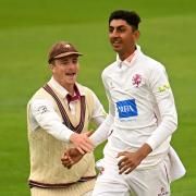 Tom Abell and Shoaib Bashir celebrate a wicket.