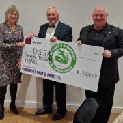 Cheque being presented to Debbie Birthwhistle of DSAA by Stuart Pope & Jim Laughlan.