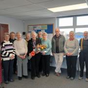 Cath Holloway, from Spark Somerset (first from the left) with Pat Galpin (holding a bouquet) at the meeting