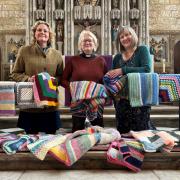 AJ Wakely donated the blankets to Revd Jo Stobart at the Minster